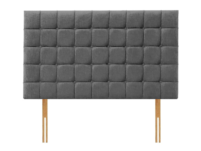 headboard with deep tufted buttons creating a square panelled deisgn. Headboard ois names Boston by Apollo.