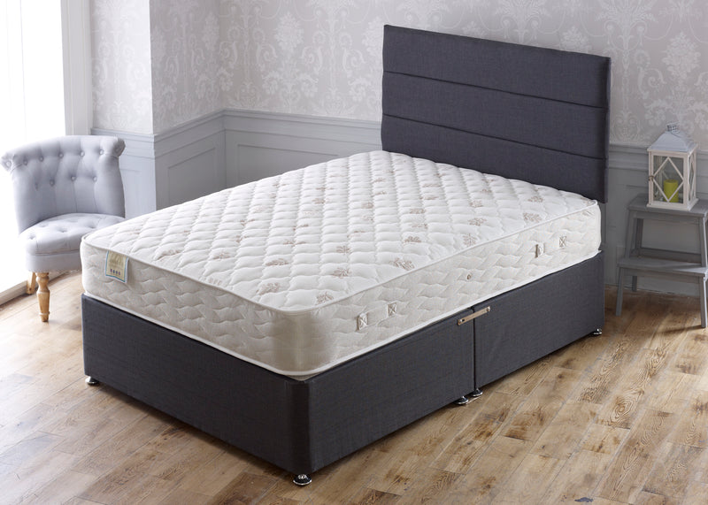 Aphrodite mattress featuring divan base and headboard covered in azzure black 