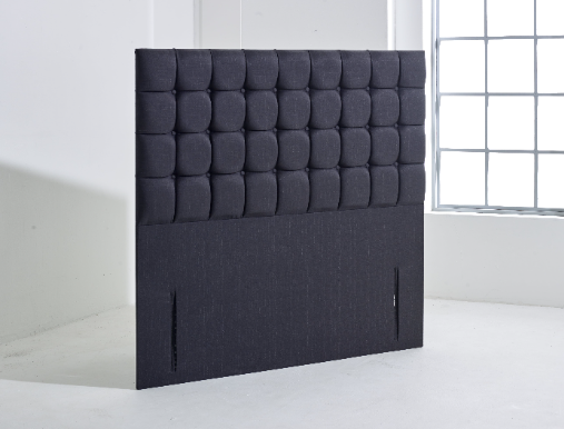 Floor standing headboard with deep tufted buttons upholstered in Azzure Black fabric  called Prague made by Apollo