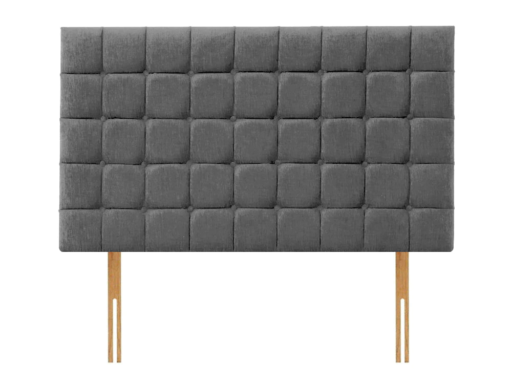headboard with deep tufted buttons creating a square panelled deisgn. Headboard ois names Boston by Apollo.